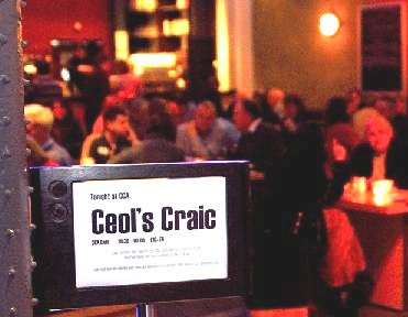 Ceòl 's craic sign and 
                      audience